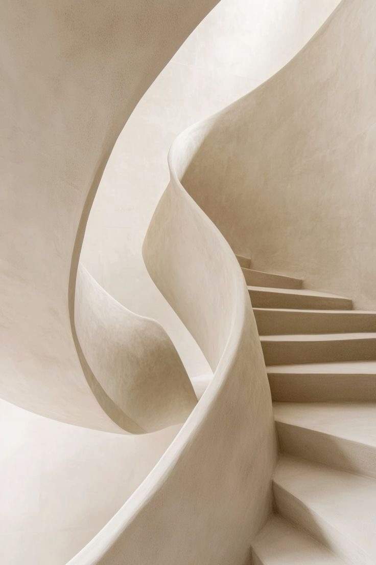 A beige architectural staircase having a natural wave shape.